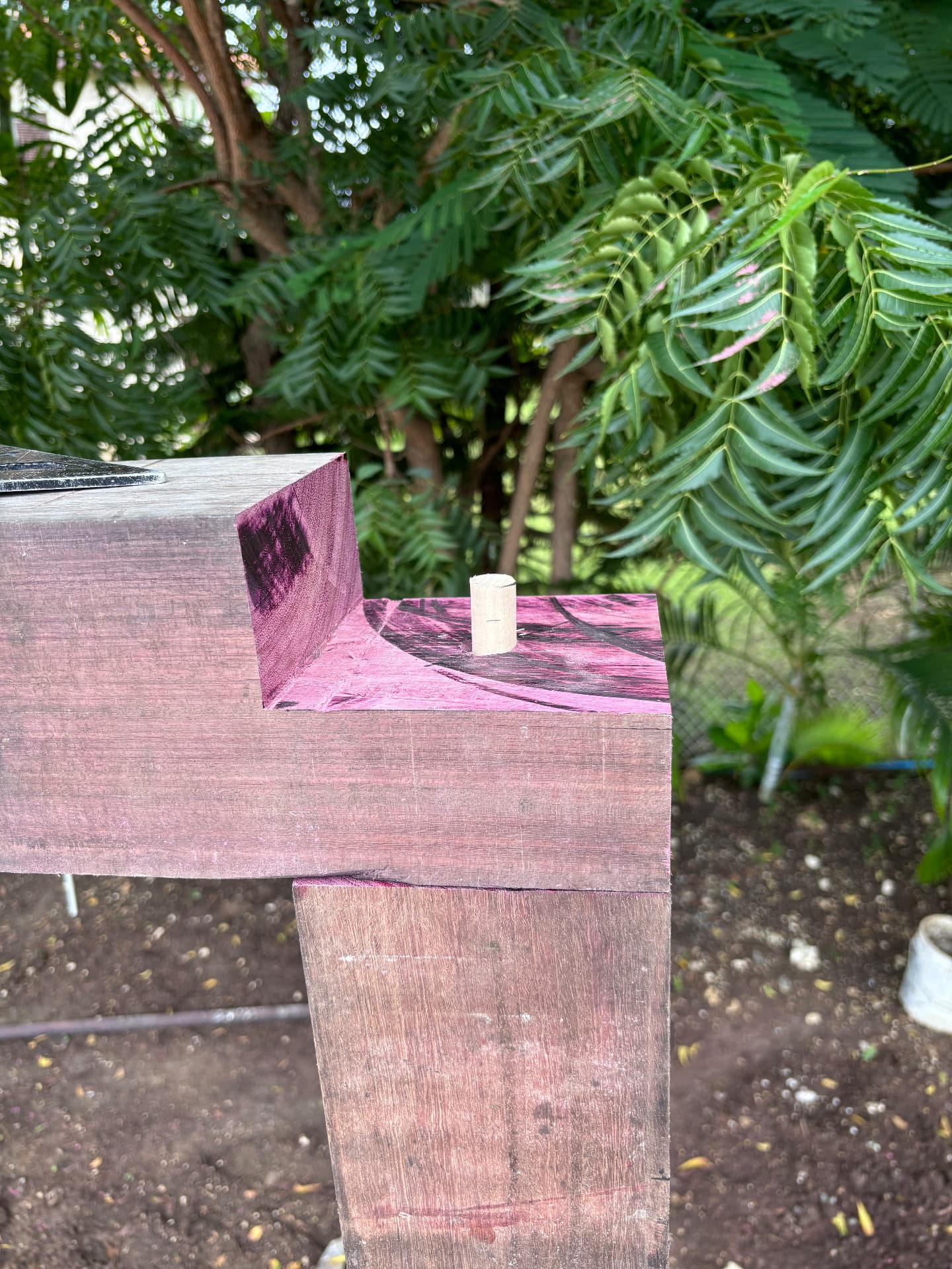 Dowelled purpleheart joint detail at the head of a pergola post
