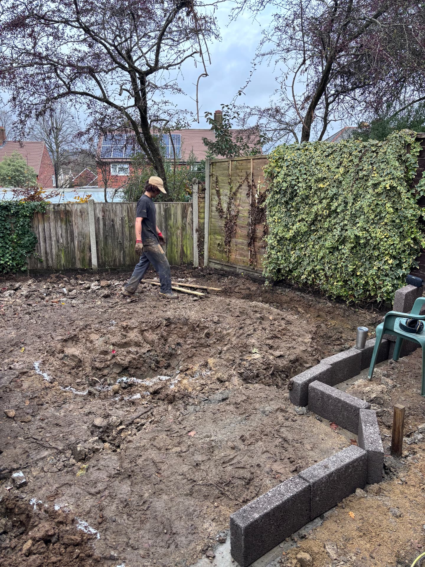 Groundworks underway with block retaining edge and excavated clay subsoil
